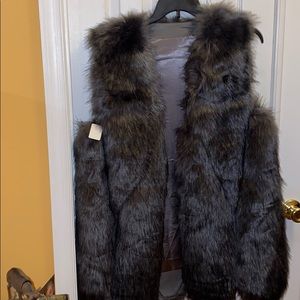 Gray and black furry vest